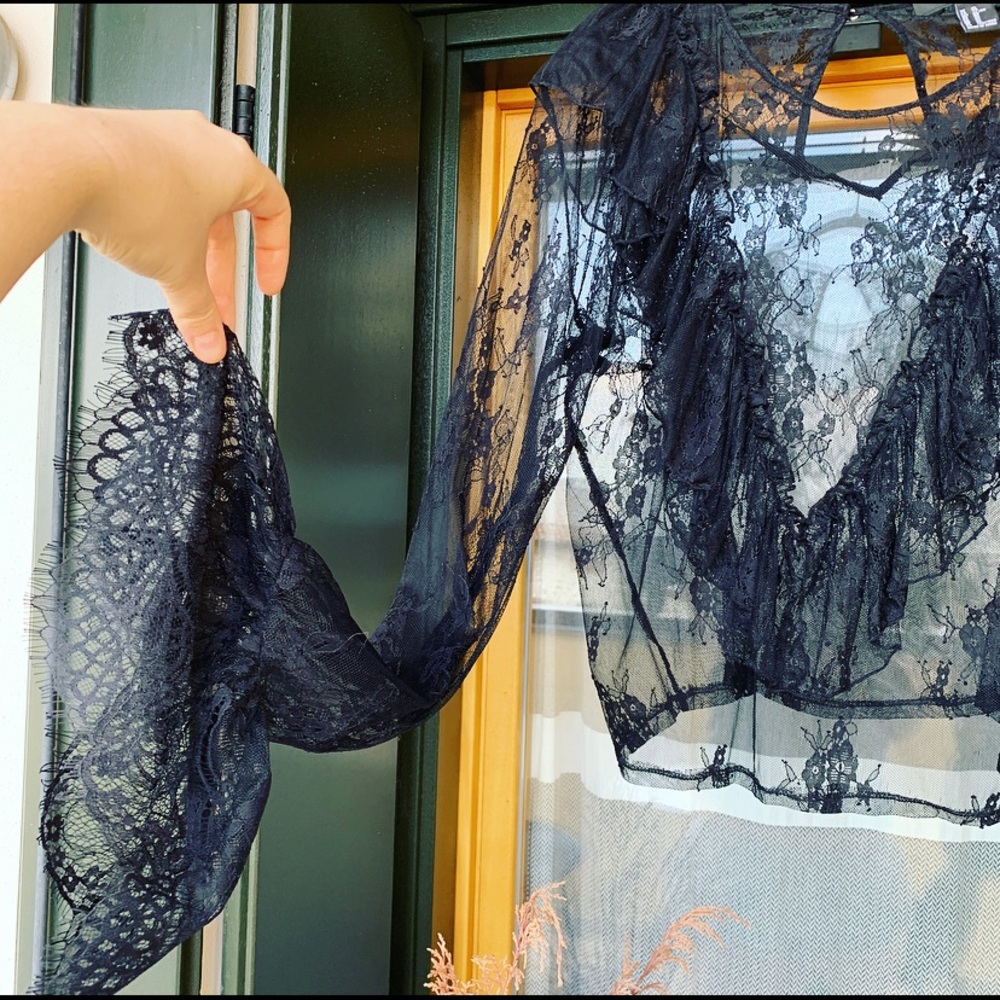 Detailed lace top with bell sleeves